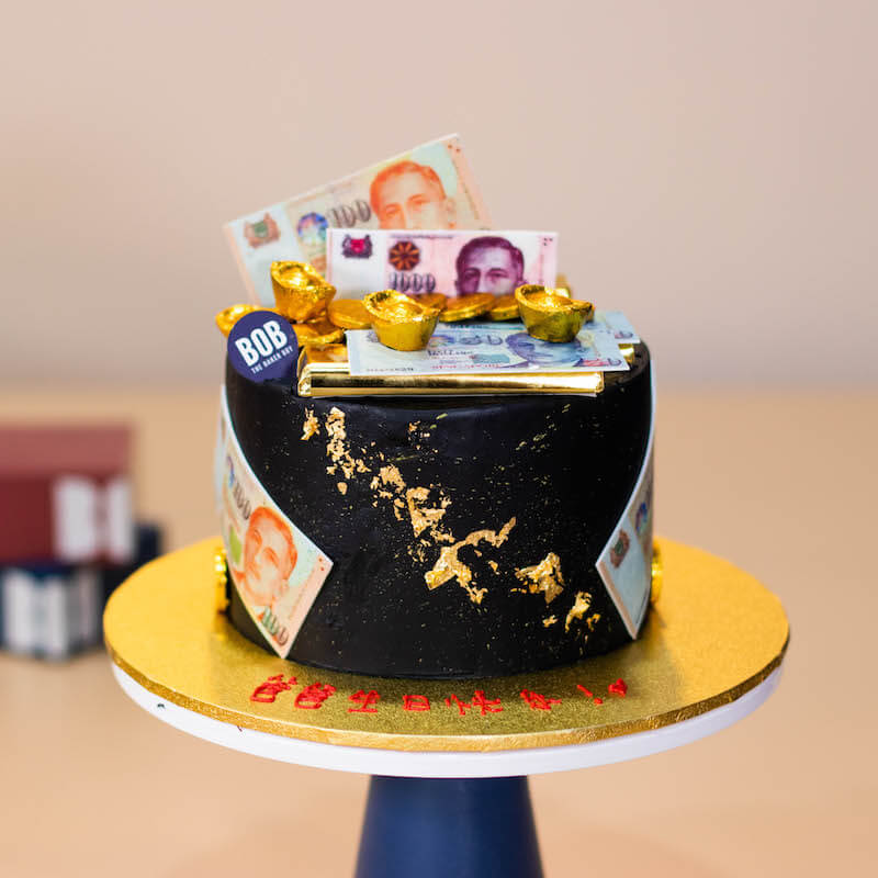 Classy Black and Gold Cash and Ingots Cake